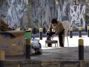 Under the new measures, non-essential workers are barred from leaving their homes, and supermarkets are supposed to operate delivery services only.  JOSEPH EID / AFP