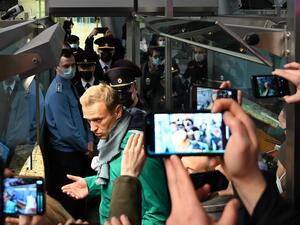 Russian opposition leader Alexei Navalny is seen at the passport control point at Moscow's Sheremetyevo airport on January 17, 2021. Russian police detained Kremlin critic Alexei Navalny at a Moscow airport shortly after he landed on a flight from Berlin, an AFP journalist at the scene said. Kirill KUDRYAVTSEV / AFP