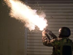 Tunisian security forces fire tear gas as protesters block a street in the Ettadhamen city suburb on the northwestern outskirts of Tunis on January 18, 2021, amidst a wave of nightly protests in the North African country. The social unrest comes at a time of economic crisis, worsened by the pandemic, that has sparked rapid inflation and high youth unemployment and led many people to leave Tunisia. FETHI BELAID / AFP