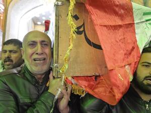 Iraqi mourners carry the coffin of a victim who was killed in a twin suicide bombing in central Baghdad, during a funeral in the holy city of Najaf on January 21, 2021. A rare twin suicide bombing killed 32 people and wounded 110 at a crowded market in central Baghdad, Iraq's government said, the city's deadliest attack in three years. The first attacker drew a crowd at the bustling market in the capital's Tayaran Square by claiming to feel sick, then detonated his explosives belt, the interior ministry sai