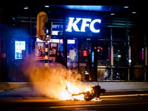 The Netherlands was hit by a second wave of riots on January 25 evening after protesters again went on the rampage in several cities following the introduction of a coronavirus curfew over the weekend. Riot police clashed with groups of protesters in the port city of Rotterdam, where they used a water canon.  Marco de Swart / ANP / AFP