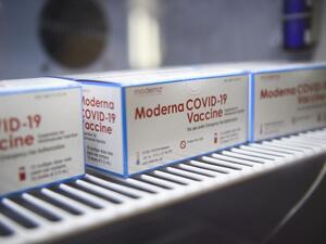 Boxes containing vials of the Moderna Covid-19 vaccine are stored at the Kedren Community Health Center on January 25, 2021 in Los Angeles, California. While vaccination priority is given to people including healthcare workers and the elderly, some outside the priority tiers are waiting in line to potentially receive a dose that needs to be administered before it expires and goes to waste. Patrick T. FALLON / AFP