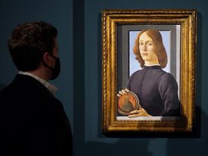 A preview of Sandro Botticelli's "Young Man Holding a Roundel" at Sotheby's on January 22, 2021 in New York City. Sotheby’s will offer the painting as part of the annual Masters Week sales series. The work is estimated to sell for in excess of $80 million, which will establish it in art market history as one of the most significant portraits to ever appear at auction. Cindy Ord/Getty Images/AFP Cindy Ord / GETTY IMAGES NORTH AMERICA / Getty Images via AFP