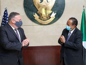 US Secretary of State Mike Pompeo (L) meets with Sudanese Prime Minister Abdalla Hamdok (R) in Khartoum, last August. (AFP)