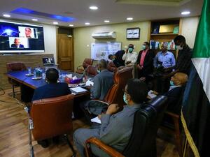 Sudan's Minister of Irrigation and Water Resources Yasir Mohamed takes part in a video meeting at the ministry in Khartoum on June 9, 2020, over the Grand Ethiopian Renaissance Dam. (AFP)