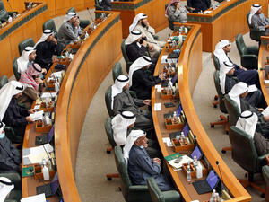 Kuwaiti MPs attend a parliament session at the National Assembly in Kuwait City, on January 5, 2021. (AFP)