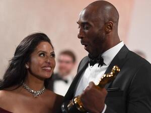 In this file photo taken on March 05, 2018 US actor and basketball player Kobe Bryant (R) holds an oscar beside his wife Vanessa Laine Bryant during the 90th Annual Academy Awards in Hollywood, California. (ANGELA WEISS / AFP)