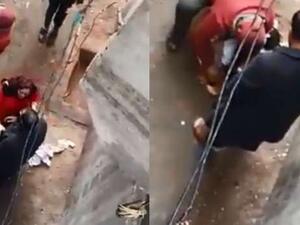 مصري يجرد رضيعته من ملابسها في الشارع ويحاول حرقها 