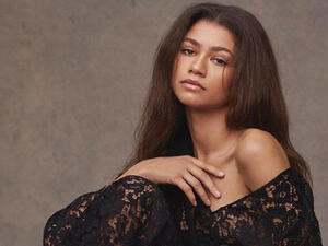  she decided to put on a wig to pass the time.