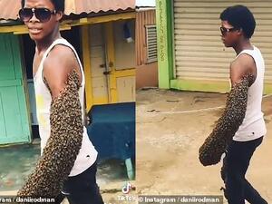 Social media footage shows the worker in the Dominican Republic, seemingly unfazed, leisurely walking down the street with his left arm covered by the army of bees. (Instagram)