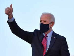 US President Joe Biden gives a thumbs up as he boards Air Force One before departing from Andrews Air Force Base in Maryland on February 5, 2021. Biden is traveling to Wilmington, Delaware where he is scheduled to spend the weekend. MANDEL NGAN / AFP