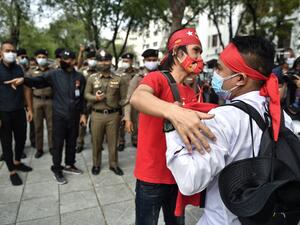 This photo taken on February 7, 2021, shows Myanmar migrants protesting against the military coup in their home country, in Bangkok. Organising protests, gathering supporters and distributing posters of their beloved leader Aung San Suu Kyi, Myanmar workers in Thailand are adding to a chorus of dissent against a coup that has upended their home country.  Lillian SUWANRUMPHA / AFP