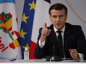 French President Emmanuel Macron speaks after a meeting with leaders of the G5 Sahel, via visio-conference, in Paris, on February 16, 2021. Francois Mori / POOL / AFP