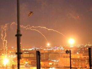 A handout picture received from the US embassy in Iraq on December 31, 2019, shows a US army apache helicopter dropping flares over Baghdad's high-security Green Zone. (File/AFP)
