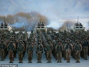 This photo taken on January 4, 2021 shows Chinese People's Liberation Army (PLA) soldiers assembling during military training in Xinjiang. (AFP)