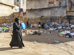 palestianans searching food in the dumb in Sabra and shatila refugee camp in beirut Lebanon 3 February 2018. (Shutterstock)