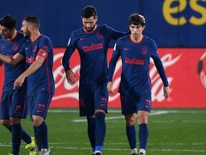 فيليكس (يمين) يحتفل بهدفه مع زملائه