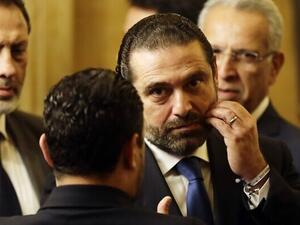 Saad Hariri (C) listens!