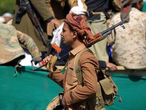 A Houthi fighter at a funeral