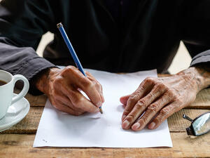 Old man with a pencil