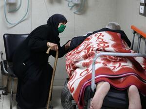 Syrians suspected of being infected with Covid-19 receive treatment at Mouwasat Hospital in Damascus