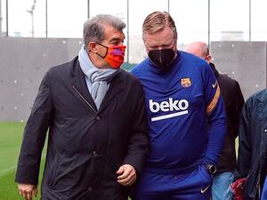 رونالد كومان وجوان لابورتا