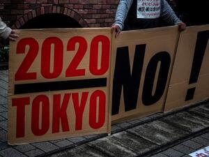 People take part in a protest against the hosting of the 2020 Tokyo Olympic Games in Tokyo 