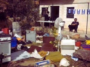 settlers taking over a Palestinian house