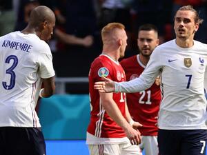 غريزمان (يمين) ينقذ فرنسا