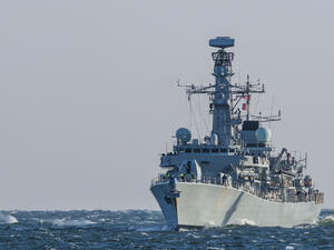 Russian military 'fires warning shots at British Navy Ship