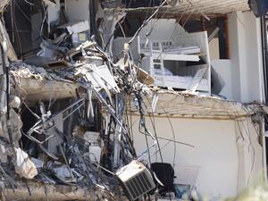 The death toll from a collapsed seaside condo in South Florida rose to 24 as more bodies were found