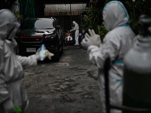 Thai hospital placing bodies in containers