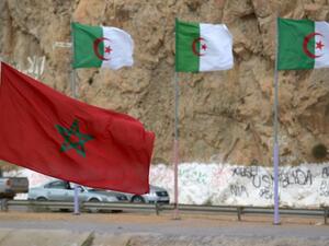 Moroccan and Algerian flags on their border 