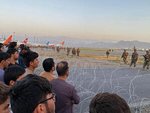 Afghans crowd at Kabul's airport