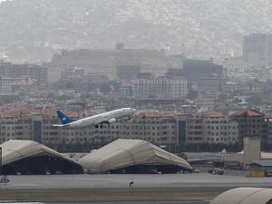Ariana Afghan Airlines aircraft taking-off from the airport in Kabul