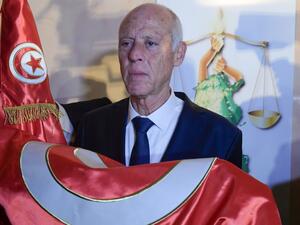 Tunisian president to change constitution, form new government