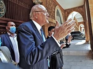 the new government will remain in power for eight months until elections next year