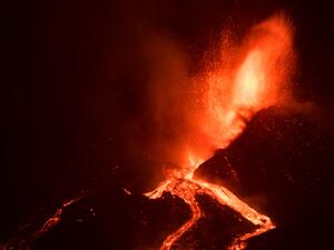 A river of red-hot lava is coming out of La Palma volcano