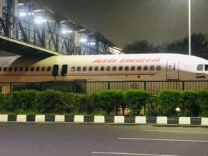 Air India plane stuck under bridge