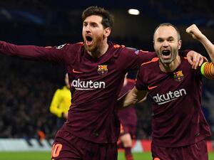 صورة أرشيفية لإنييستا و ميسي