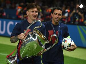 صورة أرشيفية لتشافي و ميسي