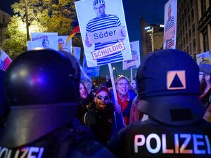 Police and protesters against Covid passports clashed during a rally in Leipzig