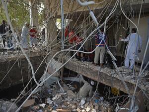 A suspected gas leak explosion kills 16 people