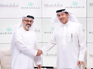 "مبادلة" و"ممتلكات" البحرينية توقعان مذكرة تفاهم لاستكشاف فرص الاستثمار العالمية المشتركة