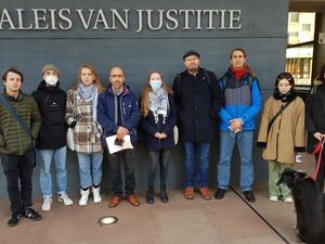 Ismail Ziada, (4th From L), with supporters outside Hague court