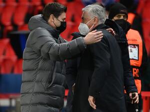 أنشيلوتي مدرب ريال مدريد (يمين) وبوتشيتينو مدرب باريس سان جيرمان