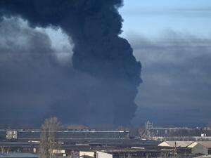 Black smoke rises from a military airport in Chuguyev