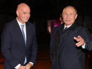 Russia's President Vladimir Putin (R) welcomes FIFA President Gianni Infantino upon his arrival to the far-eastern Russian port of Vladivostok on September 4, 2019, ahead of the start of the Eastern Economic Forum hosted by Russia. / AFP / SPUTNIK / Mikhail Klimentyev