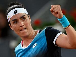 أنس جابر تظفر باللقب (المصدر: أ ف ب)