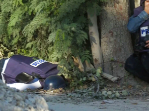 The body of Sherine Abu Aqleh on the ground 